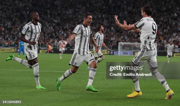 Dusan Vlahovic of Juventus celebrates his second goal with his team-mate Angel Di Maria and Denis Zakaria during the Serie A match between Juventus...