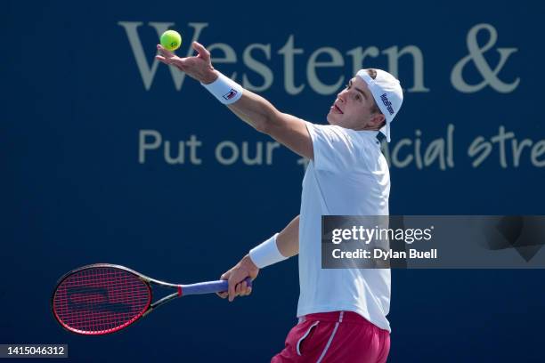 John Isner of the United States serves during his match against Benjamin Bonzi of France during the Western & Southern Open at the Lindner Family...