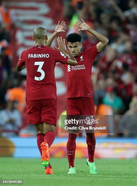 Luis Diaz of Liverpool celebrates with Fabinho after scoring their team's first goal during the Premier League match between Liverpool FC and Crystal...