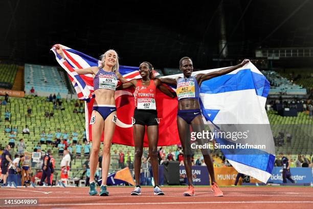 Silver medalist Eilish McColgan, Gold medalist Yasemin Can of Turkey and Bronze medalist Lonah Chemtai Salpeter of Israel celebrate after the...