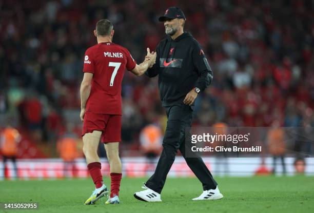 Liverpool Mananger, Jurgen Klopp interacts with James Milner of Liverpool after the Premier League match between Liverpool FC and Crystal Palace at...