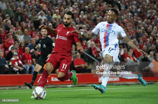 Mohamed Salah of Liverpool battles for possession with Nathaniel Clyne of Crystal Palace during the Premier League match between Liverpool FC and...
