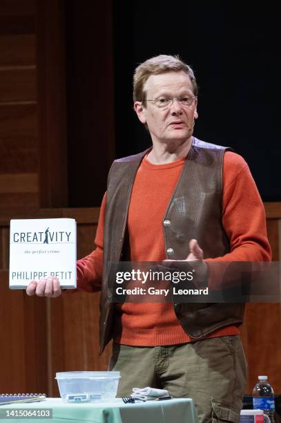 During the Aloud series at the Los Angeles Central Library high-wire artist Philippe Petit poses for a portrait with his book Creativity on May 22,...