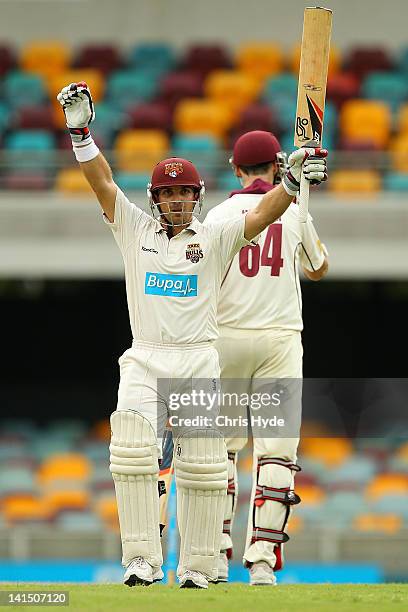 Chris Hartley of the Bulls celebrates his century during day three of the Sheffield Shield match between the Queensland Bulls and the Tasmania Tigers...