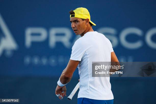 Rafael Nadal of Spain practices with his coach, Francisco Roig Genís in advance of his first match at the Lindner Family Tennis Center on August 15,...