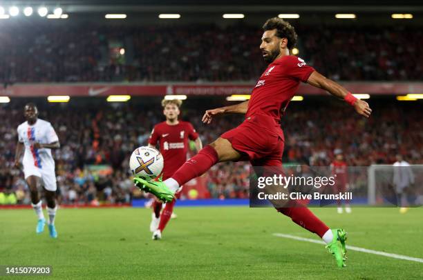 Mohamed Salah of Liverpool controls the ball during the Premier League match between Liverpool FC and Crystal Palace at Anfield on August 15, 2022 in...