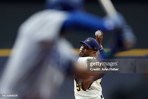 Freddy Peralta of the Milwaukee Brewers throws a pitch in the first inning against the Los Angeles Dodgers at American Family Field on August 15,...