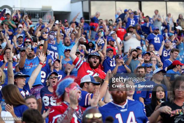 Fans react after Tyler Bass of the Buffalo Bills kicked a game-winning field goal against the Indianapolis Colts in a preseason game at Highmark...