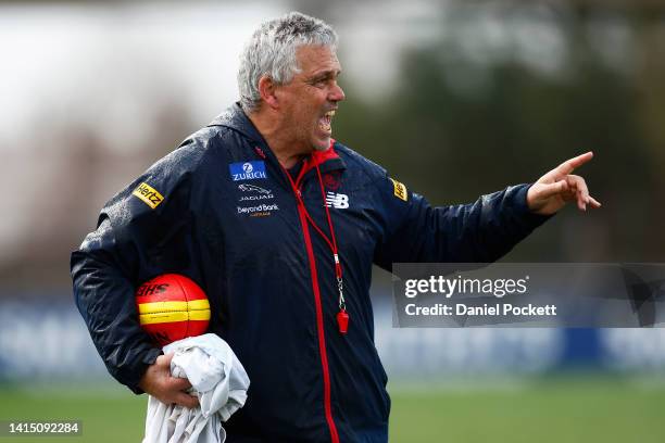 Demons assistant coach Mark Williams directs players during a Melbourne Demons AFL training session at Casey Fields on August 16, 2022 in Melbourne,...