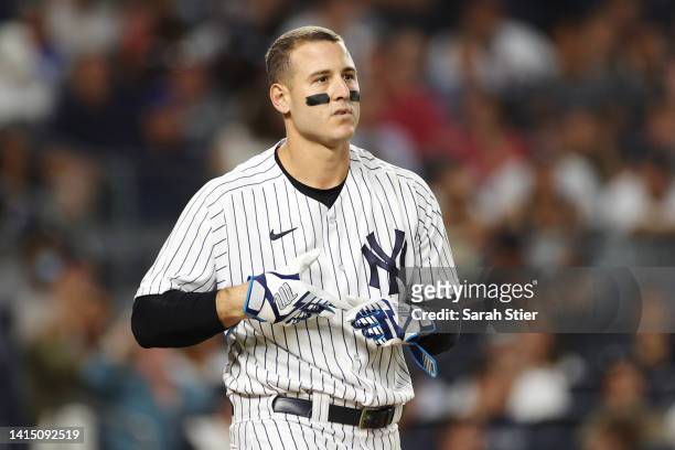 Anthony Rizzo of the New York Yankees reacts after striking out during the eighth inning against the Tampa Bay Rays at Yankee Stadium on August 15,...
