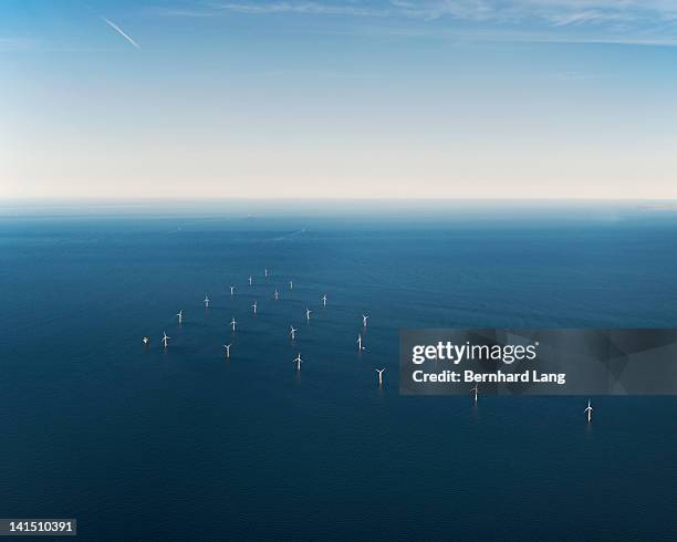 wind park in sea, aerial view - offshore windfarm stock-fotos und bilder