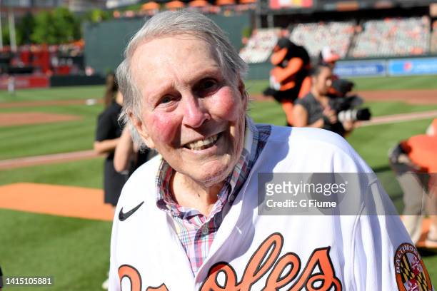 Former Baltimore Orioles Brooks Robinson walks on the field before the game against the Pittsburgh Pirates at Oriole Park at Camden Yards on August...