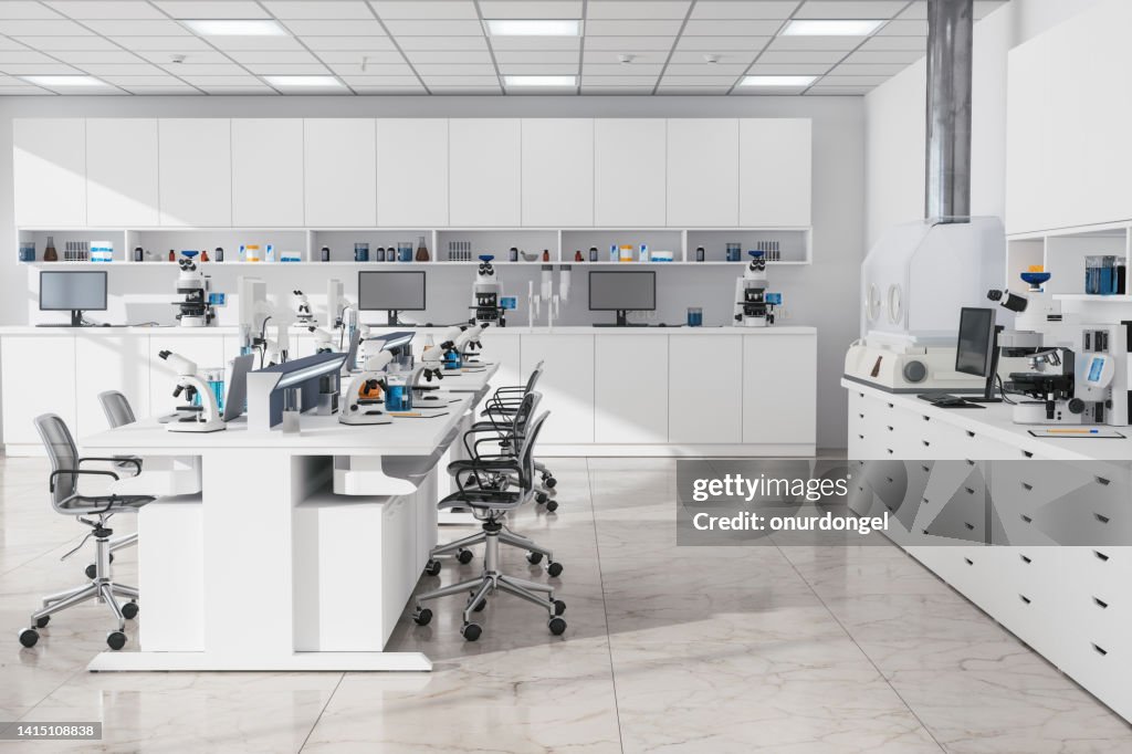 Moderno laboratorio scientifico vuoto con computer, microscopi, provette e altre attrezzature di laboratorio
