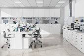 Modern Empty Science Laboratory With Computers, Microscopes, Test Tubes And Other Laboratory Equipments