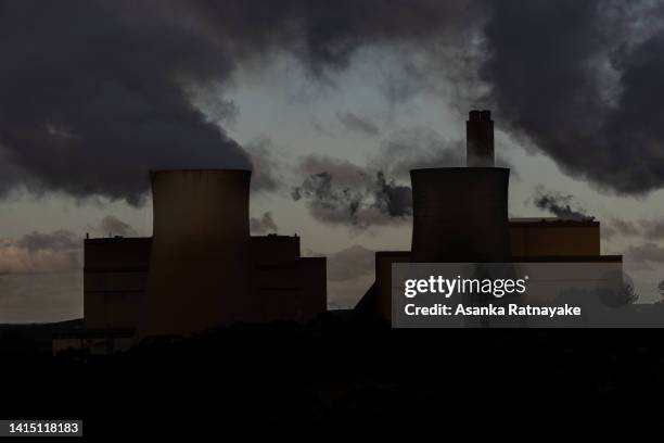 Silhouetted general view of The Yallourn Power Station, now owned by EnergyAustralia on August 16, 2022 in Yallourn, Australia. The Greens will...