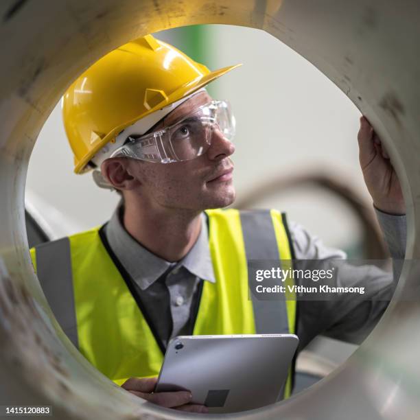 engineer inspection quality steel row for structure at industrial manufacturer. - occupational health and safety audit stock pictures, royalty-free photos & images