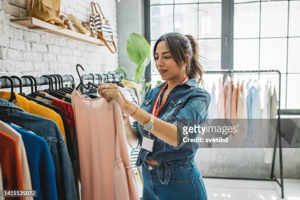 sustainable shopping - fashion store staff stock pictures, royalty-free photos & images