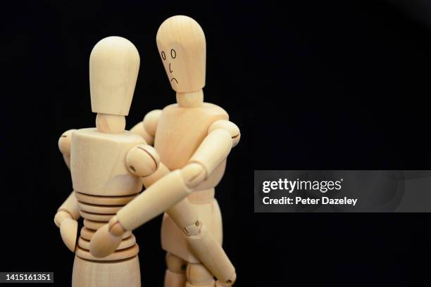 unhappy couple grieving - male likeness stock pictures, royalty-free photos & images