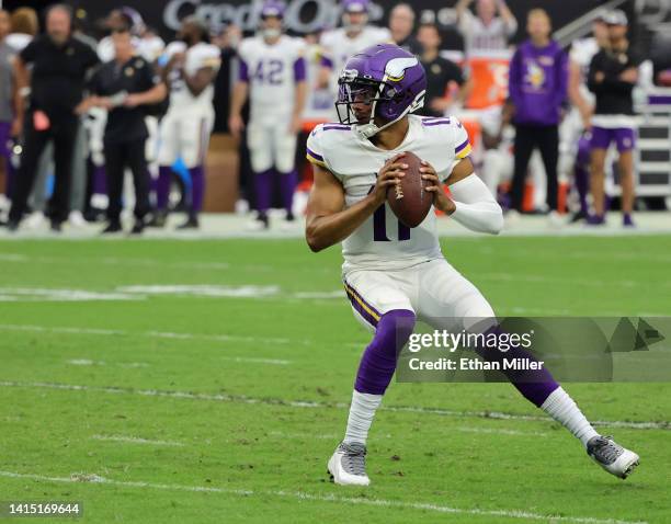 Quarterback Kellen Mond of the Minnesota Vikings looks to throw against the Las Vegas Raiders during their preseason game at Allegiant Stadium on...