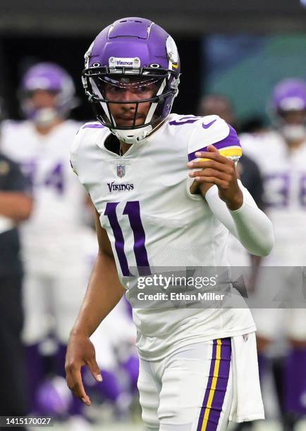 Quarterback Kellen Mond of the Minnesota Vikings gestures before running a play against the Las Vegas Raiders during their preseason game at...