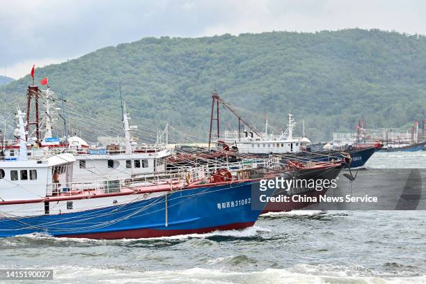 Fishing boats set sail to South China Sea for fishing on August 16, 2022 in Yangjiang, Guangdong Province of China. The seasonal fishing ban in the...