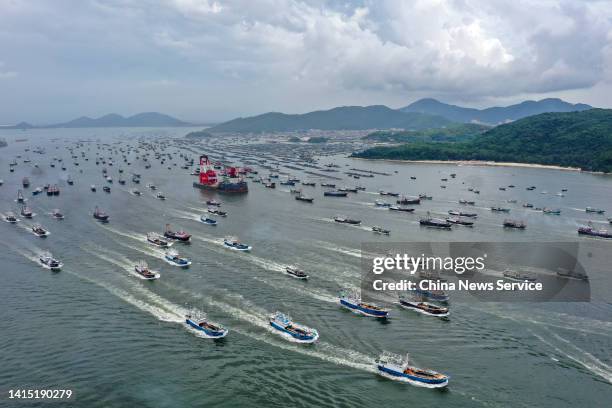 Fishing boats set sail to South China Sea for fishing on August 16, 2022 in Yangjiang, Guangdong Province of China. The seasonal fishing ban in the...