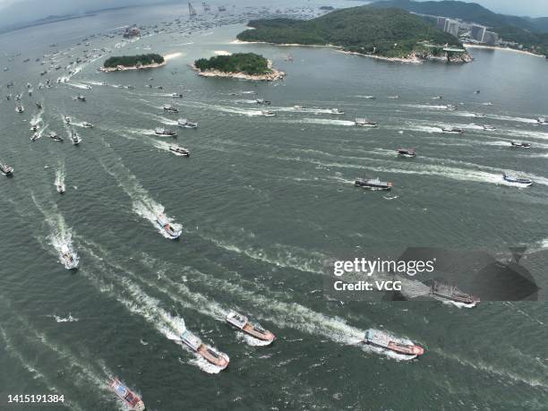 Aerial view of fishing boats setting sail to South China Sea for fishing on August 16, 2022 in Yangjiang, Guangdong Province of China. The seasonal...
