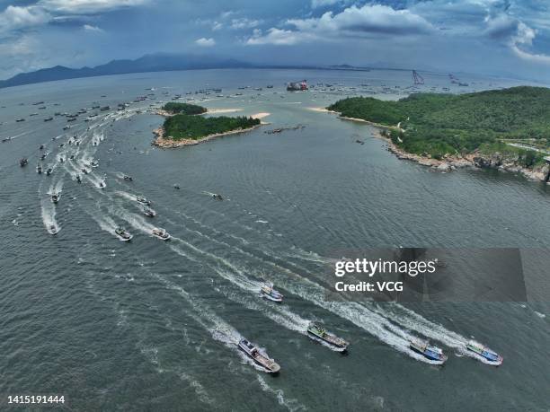 Aerial view of fishing boats setting sail to South China Sea for fishing on August 16, 2022 in Yangjiang, Guangdong Province of China. The seasonal...