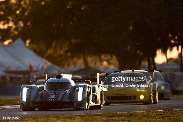 The Audi Sport Team Joest Audi R18 driven by Timo Berhnard of Germany, Romain Dumas of France, and Loic Duval of France during the 2012 World...