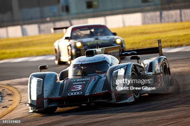 The Audi Sport Team Joest Audi R18 driven by Timo Berhnard of Germany, Romain Dumas of France, and Loic Duval of France during the 2012 World...