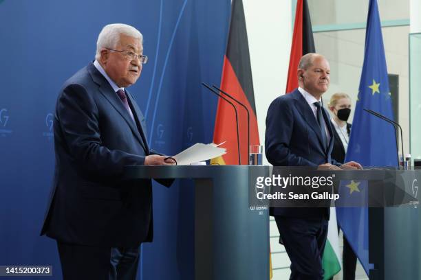 Mahmoud Abbas , President of the Palestinian National Authority, and German Chancellor Olaf Scholz speak to the media following talks at the...
