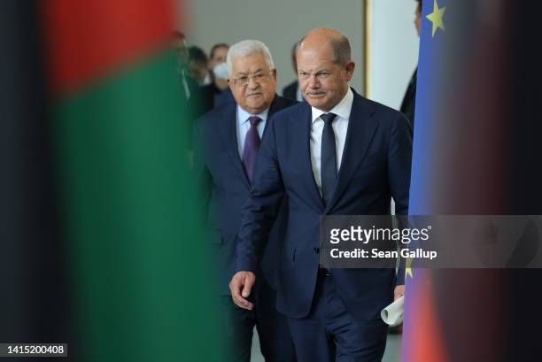 Mahmoud Abbas , President of the Palestinian National Authority, and German Chancellor Olaf Scholz arrive to speak to the media following talks at...