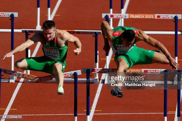 Balint Szeles of Hungary crashes in a hurdle next to Joao Vitor De Oliveira of Portugal in the Men's 110m Hurdles - Round 1 Heat 2 during the...