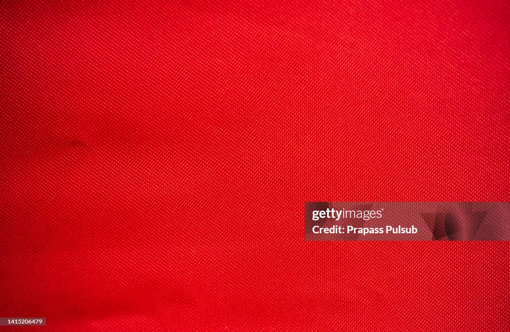 Red fabric cloth polyester texture and textile background