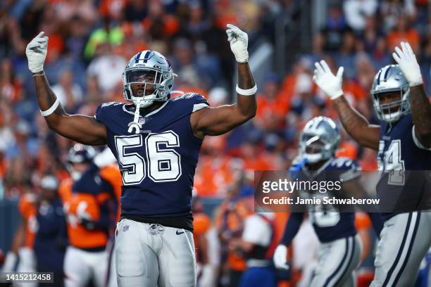 Dante Fowler Jr. #56 of the Dallas Cowboys reacts to a play against the Denver Broncos during a preseason game at Empower Field At Mile High on...
