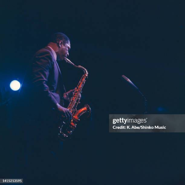 John Coltrane plays the tenor saxophone to the mic, Sankei Hall, Tokyo, Japan, 11th July 1966.
