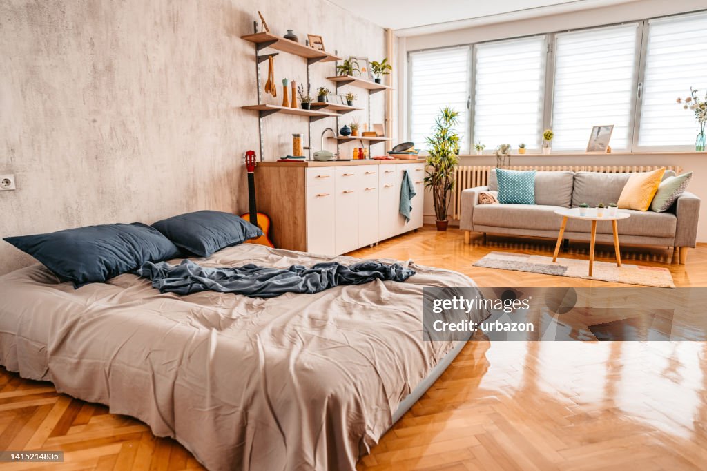 Lessy Bed Messy Bed In Studio Apartment High-Res Stock Photo - Getty Images