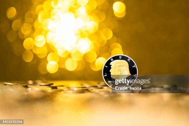 coin with donald trump on shiny background - trump asia stock pictures, royalty-free photos & images