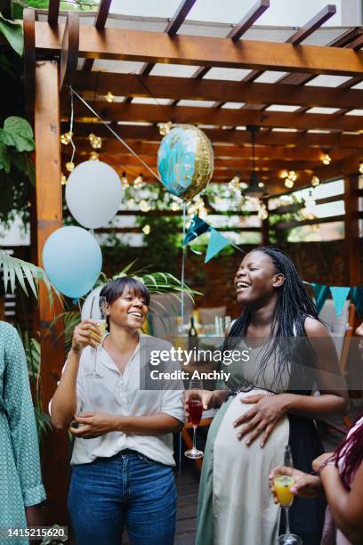 group of female friends having fun at baby shower - outdoor baby shower stock pictures, royalty-free photos & images