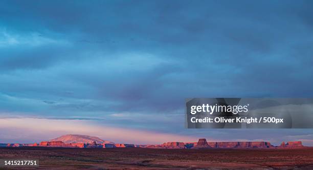 scenic view of landscape against cloudy sky,lake powell,united states,usa - lake powell - fotografias e filmes do acervo