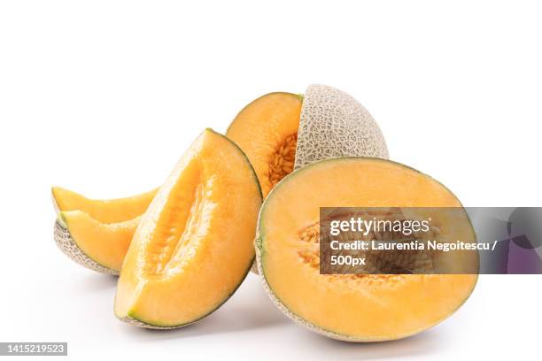 beautiful tasty sliced juicy cantaloupe melon,muskmelon,rock melon isolated on white background,c - muskmelon stock pictures, royalty-free photos & images