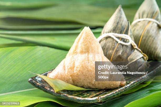 close up,copy space,famous asian tasty food in dragon boat duan wu festival,steamed rice dumpli - alpinia zerumbet stock pictures, royalty-free photos & images