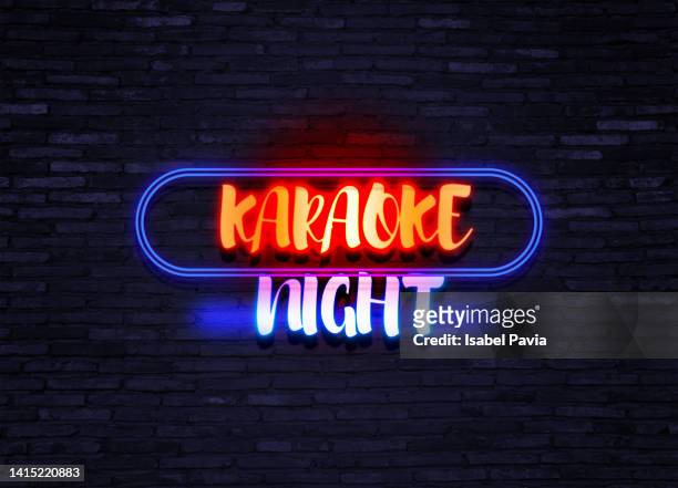 karaoke night message in neon lights - karaoke anlage stock-fotos und bilder