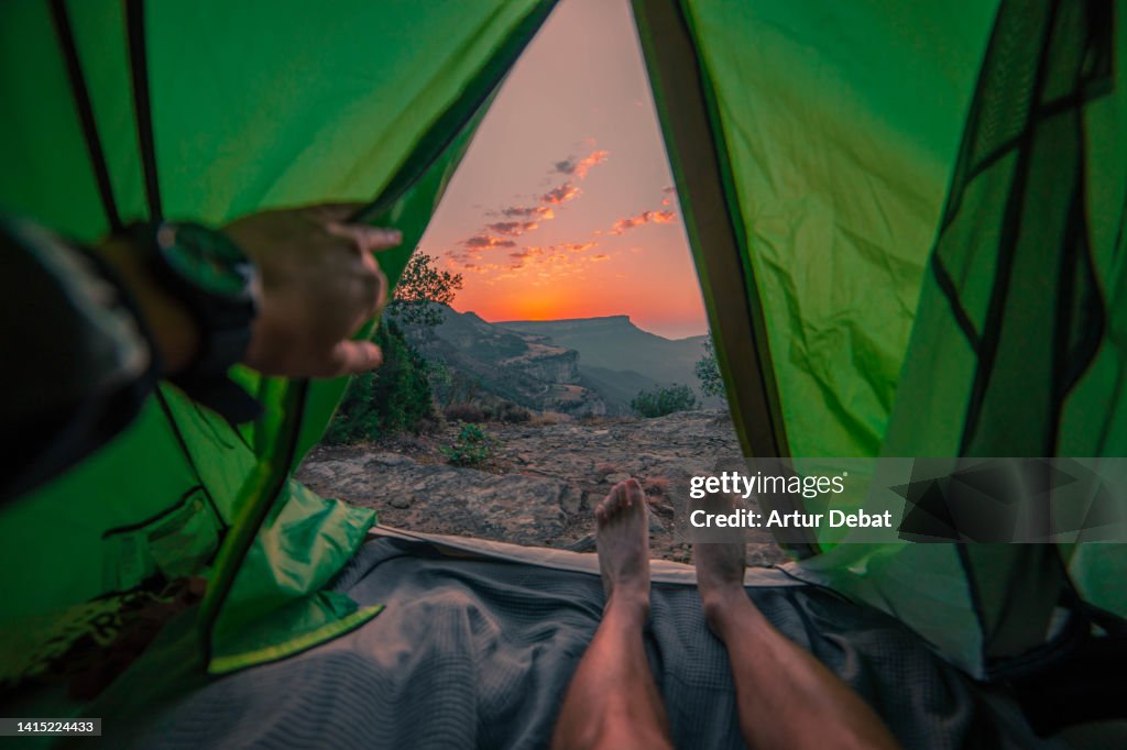 Waking up from camping with the sunrise view from the tent.