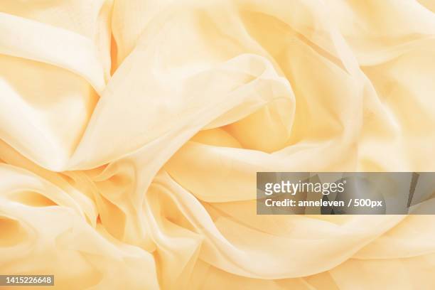 wavy silk fabric - soft background and texture styled concept - organdy stockfoto's en -beelden