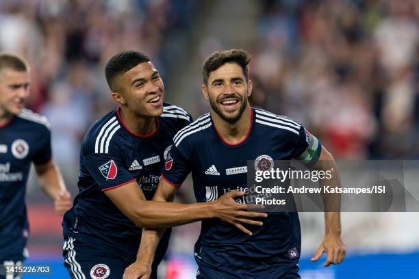 Carles Gil of New England Revolution celebrates his goal with teammates during a game between D.C. United and New England Revolution at Gillette...