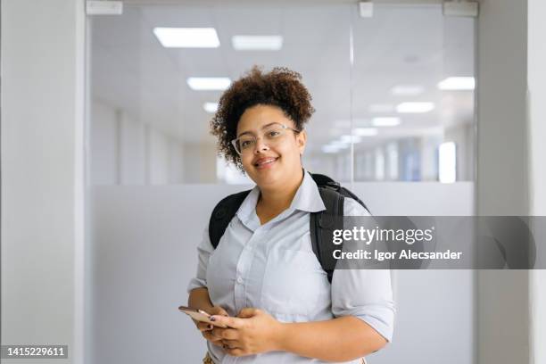 portrait of a female intern at the company - large rucksack stock pictures, royalty-free photos & images