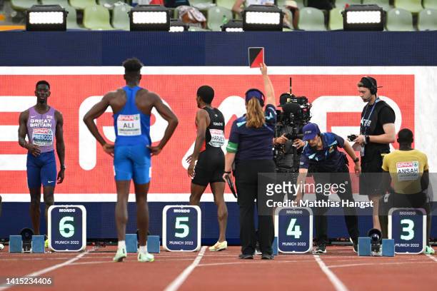 Jak Ali Harvey of Turkey is disqualified during the Athletics - Men's 100m Semi Final 2 on day 6 of the European Championships Munich 2022 at...