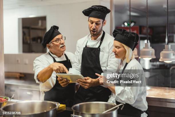 Cooking Staff Restaurant Kitchen Staff Photos and Premium High Res Pictures - Getty ...