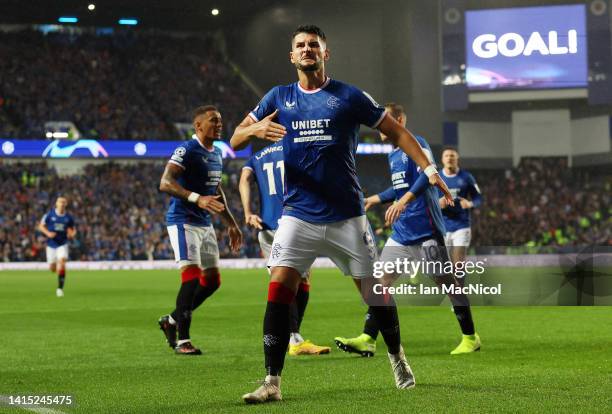 Antonio-Mirko Colak of Rangers celebrates after scoring their team's first goal during the UEFA Champions League Play-Off First Leg match between...